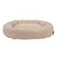 Beige dog bed on a white background